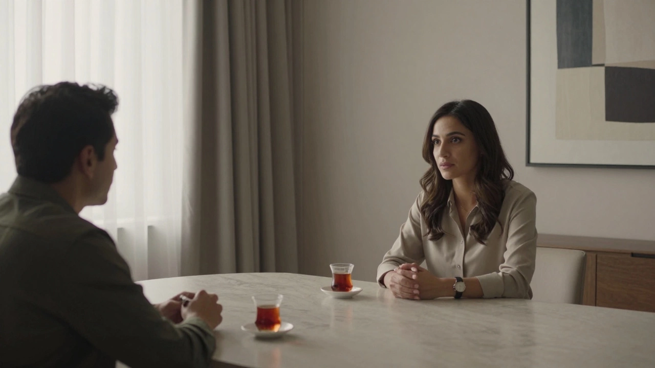 A calm private meeting in a Dubai apartment with two tea cups on a minimalist table and soft natural light.